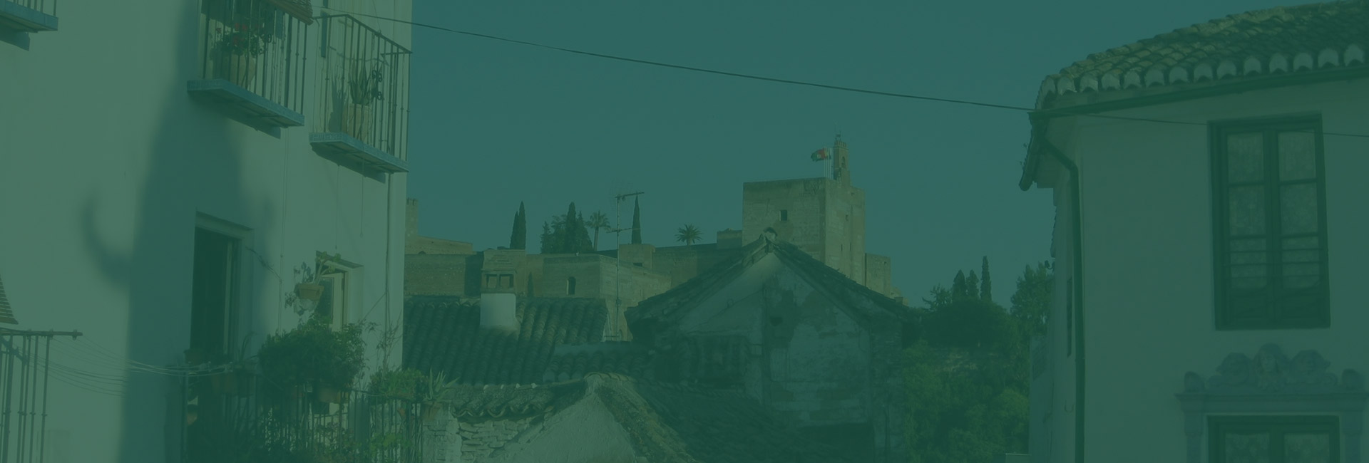 fondo-inicio Vista panorámica del Albaicín de Granada al atardecer